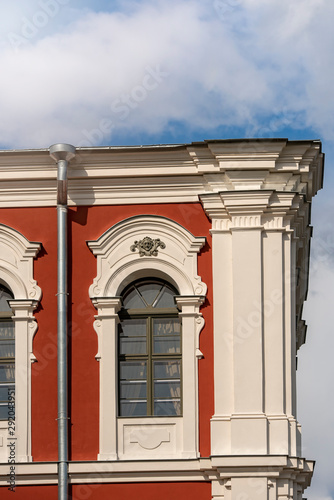 Close-up details of Baroque-style palace in red. photo