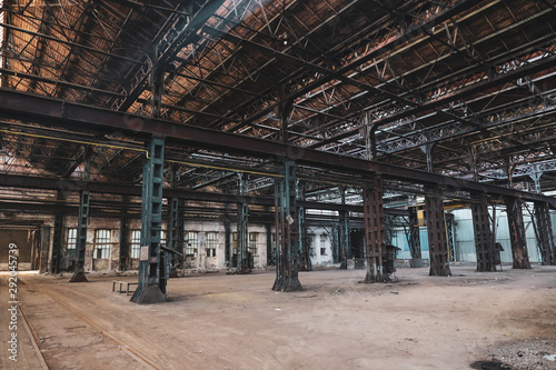 Abandoned hall in a dirty and old factory.