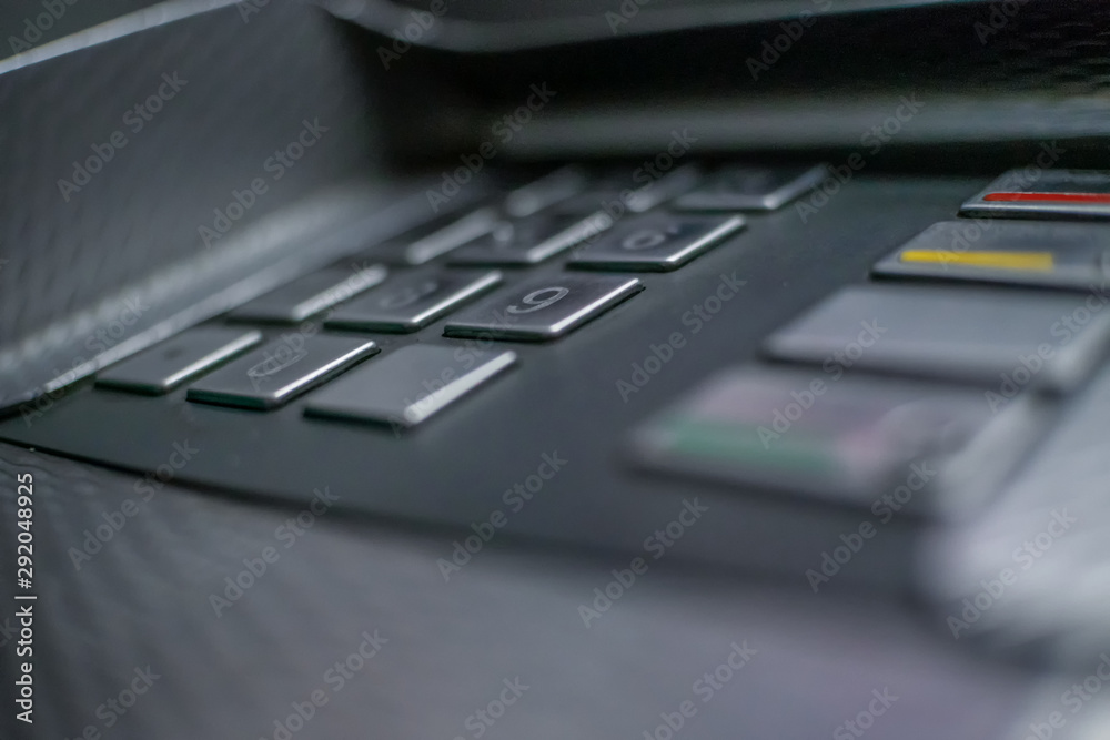 Close-up of ATM buttons at night
