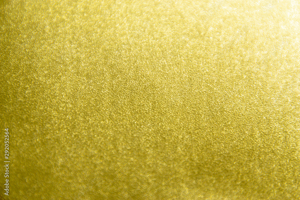 Shiny yellow gold leaf foil texture background Shiny yellow gold leaf foil texture background