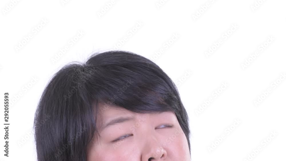 Eyes of happy overweight Asian woman thinking and looking up Eyes of happy overweight Asian woman thinking and looking up