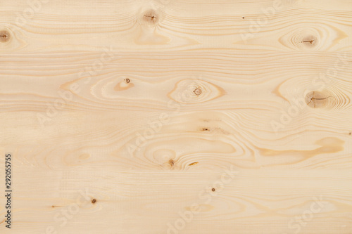 Freshly-planed wood planks closeup