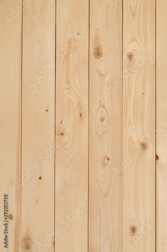 Freshly-planed wood planks closeup