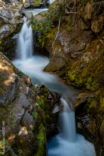 Water Streams Through Carved Rocks Above Christine Falls © kellyvandellen