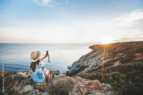 Female traveller at the cliff