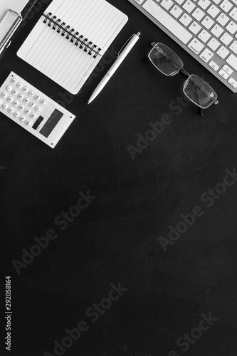 Minimalistic black office desk flat lay copy space top view