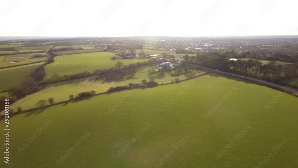 4K Aerial Shot Over Lush Green Fields And Meadows In The English Countryside, farming fields in, British,