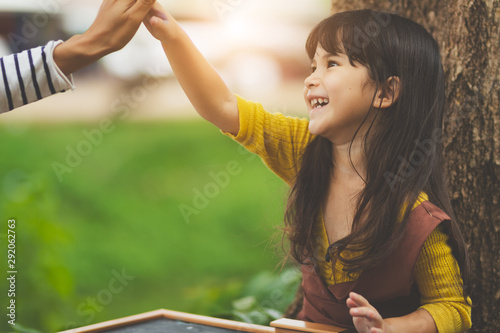 foreigner  girl learning,playing in holiday with happy. photo