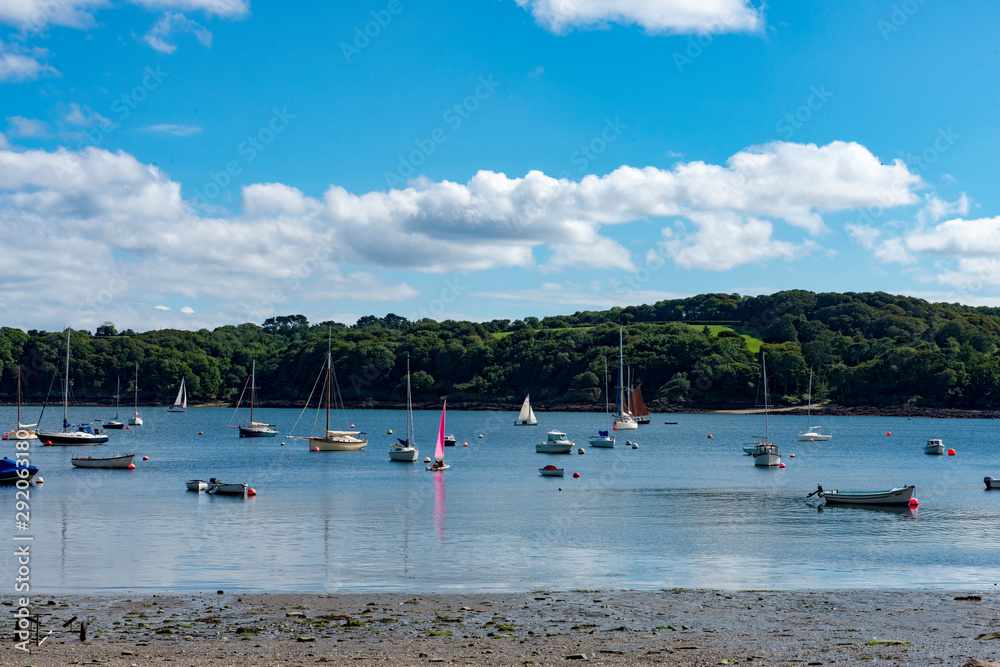 View of small boats on the Helford River in Cornwall, UK