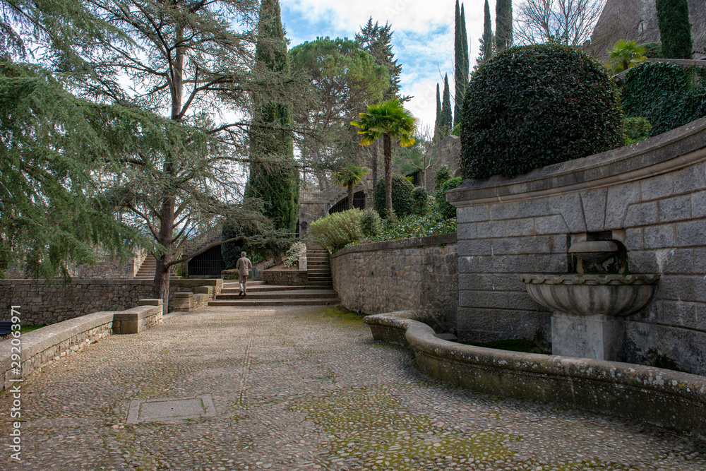 Quiet public gardens in Girona, Spain in early spring