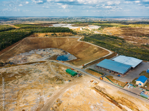 City dump. Aerial view of urban solid waste landfill photo