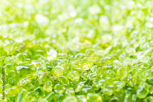 Peridot Background – Sparkling Green Gem for Refreshing and Natural Impressions