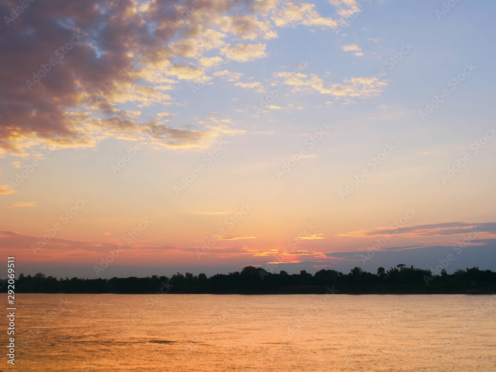 Beautiful Landscape of the sky before the sunset time near the river.