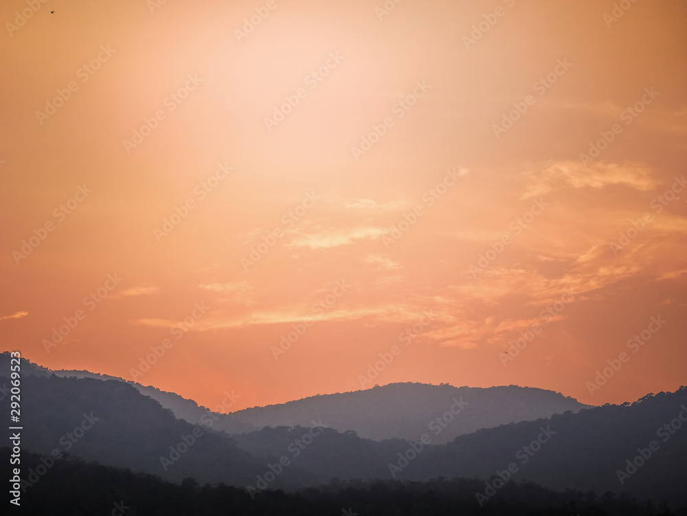Beautiful orange sunset over the mountain, orange sky