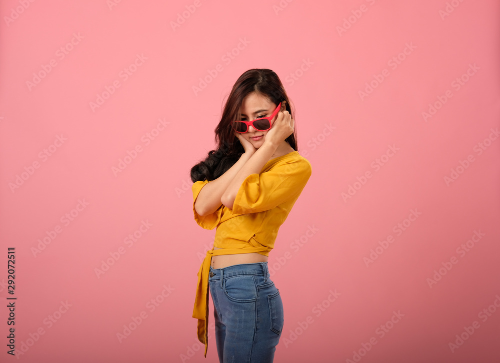 studio portrait of smiling asian woman in casual clothing. studio shot studio portrait of smiling asian woman in casual clothing. studio shot