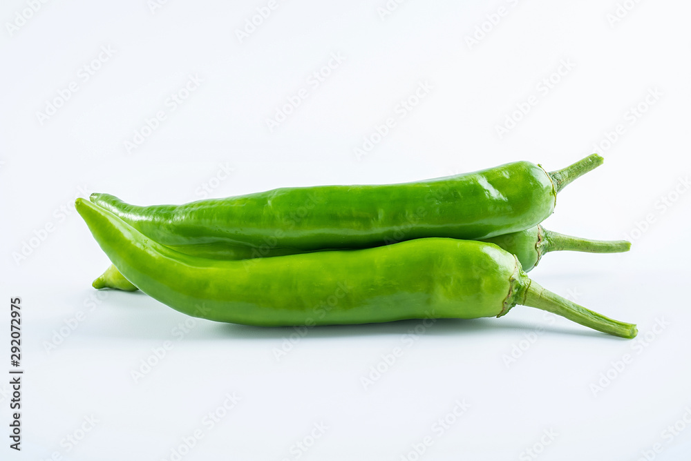 Fresh green green pepper on white background Fresh green green pepper on white background