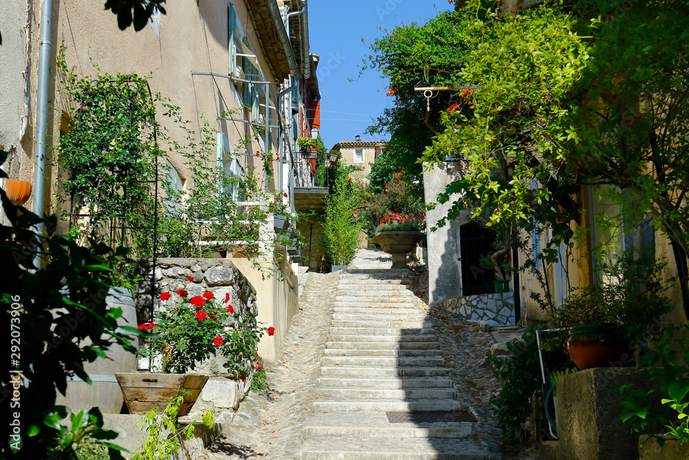 street  of mediterranean village with colorful shutter in the south of france,provence