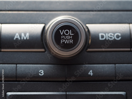 Close up volume botton at car console
