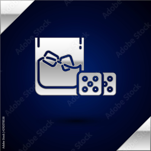 Silver Game dice and glass of whiskey with ice cubes icon isolated on dark blue background. Casino gambling. Vector Illustration