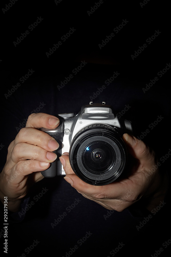 Hands with a camera