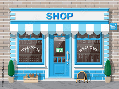 Empty store front with window and door. Wooden and brick facade. Glass showcase of boutique. Small european style shop exterior. Commercial, property, market or supermarket. Flat vector illustration photo