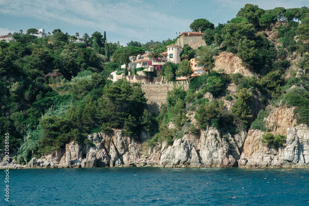 Cottage on a cliff view from the sea