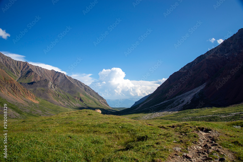  The mountain ranges of Satan and Hamar-Daban. Mountain peaks and valleys. Mountain landscape. The nature of Siberia.