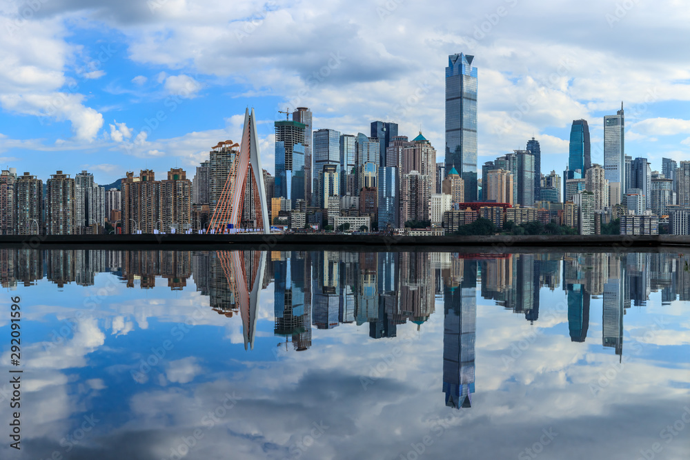 Chongqing skyline and modern urban skyscrapers with water reflection,China.