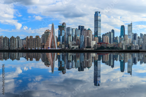 Chongqing skyline and modern urban skyscrapers with water reflection,China.