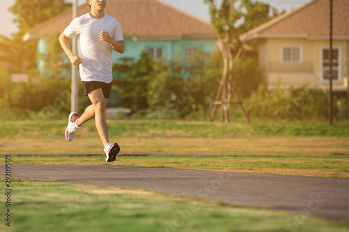 Bild auf Leinwand Healthy lifestyle young fitness man running at the park