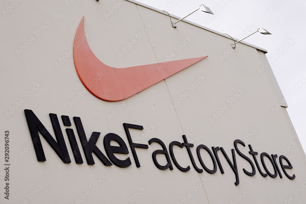 Bordeaux , Aquitaine / France - 09 24 2019 : Detail of the Nike factory  store American shop multinational corporation manufactures sells footwear  apparel and equipment foto de Stock | Adobe Stock