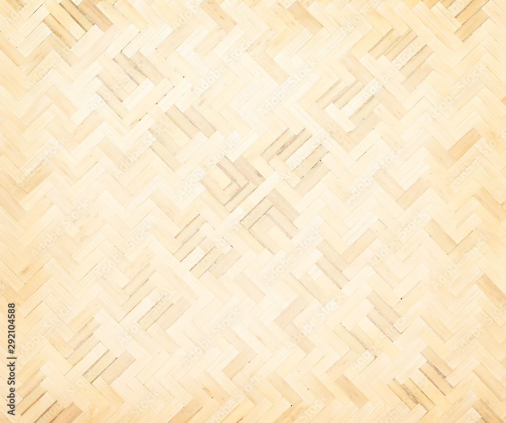 Old bamboo straw wood mat texture in interlace seamless shaped patterns for light brown background Old bamboo straw wood mat texture in interlace seamless shaped patterns for light brown background