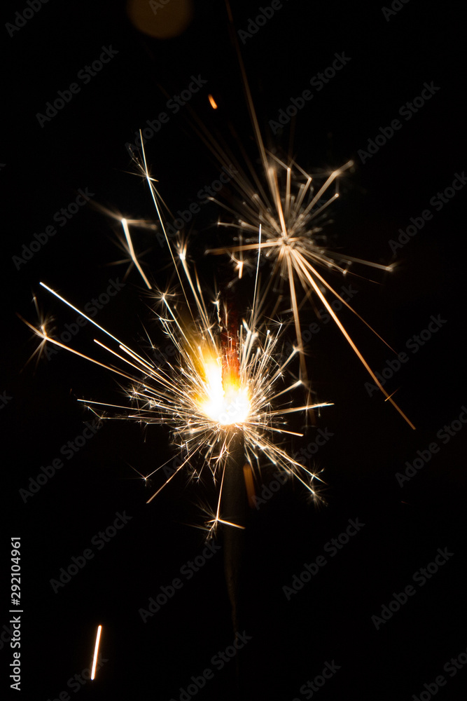 Bengal fire sparkles isolated on black background 