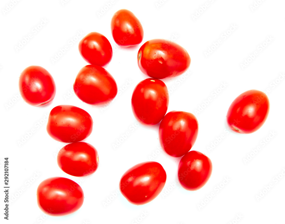 Red cherry tomatoes on a white background Red cherry tomatoes on a white background