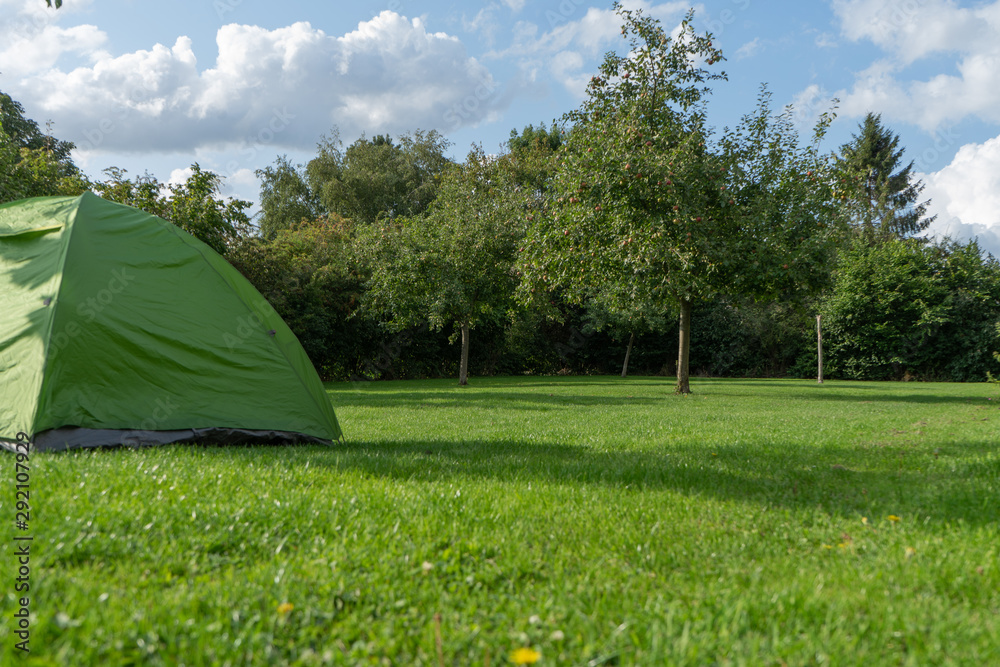 Camping on the farm in the Apple orchard, eco-tourism. European camping