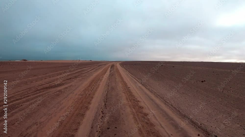 FPV of dune riding and 4x4 driving in sand dunes and on the beach. Shot in the Namibian Skeleton Coast, part of the Namib Desert FPV of dune riding and 4x4 driving in sand dunes and on the beach. Shot in the Namibian Skeleton Coast, part of the Namib Desert