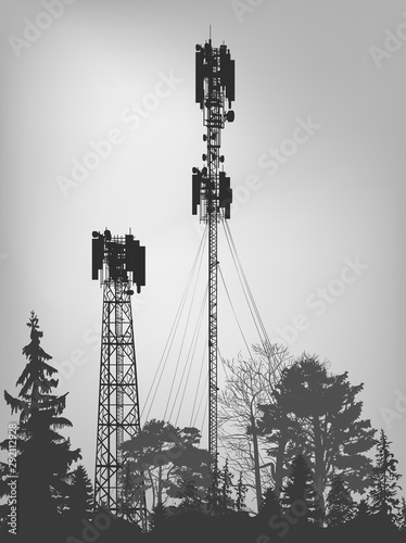 telecommunications towers silhouettes in forest on grey background
