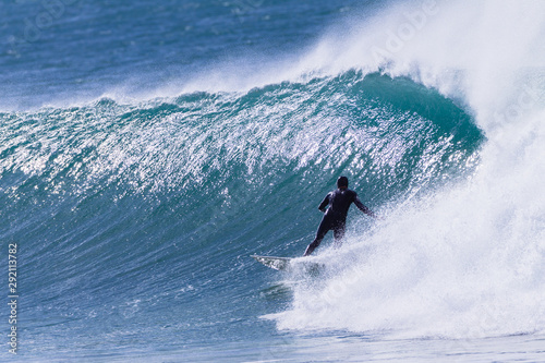 Surfer Surfing Rides Windy Cold Wave Rear Behind Action