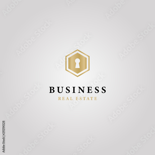 realty business gold logo on silver background with black letters