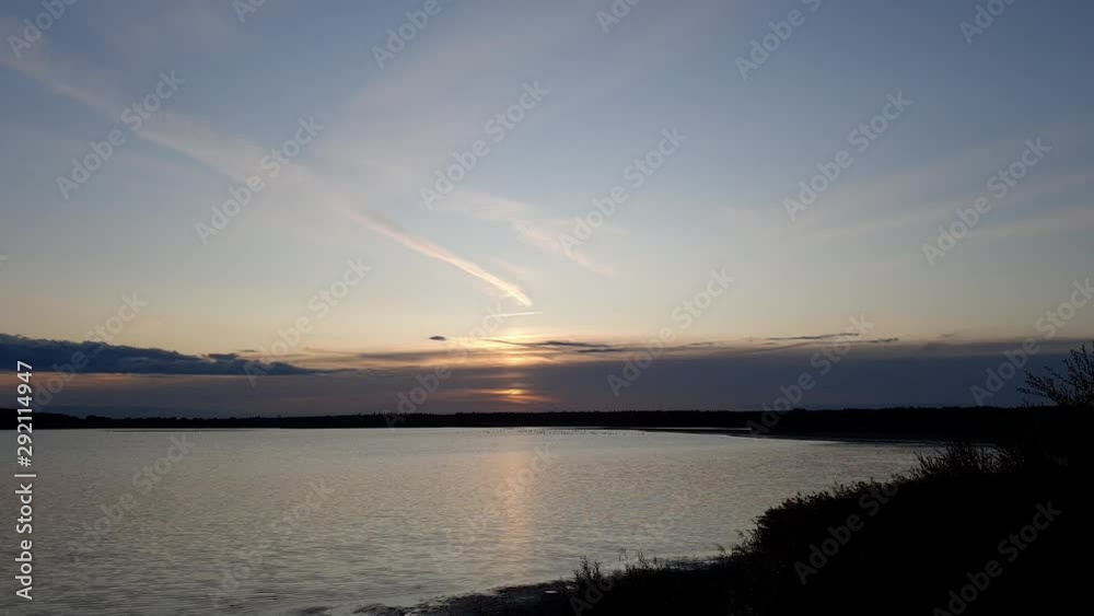 Stunning sunset dawning over the skies of Baryczy river flora Poland time lapse shot Stunning sunset dawning over the skies of Baryczy river flora Poland time lapse shot