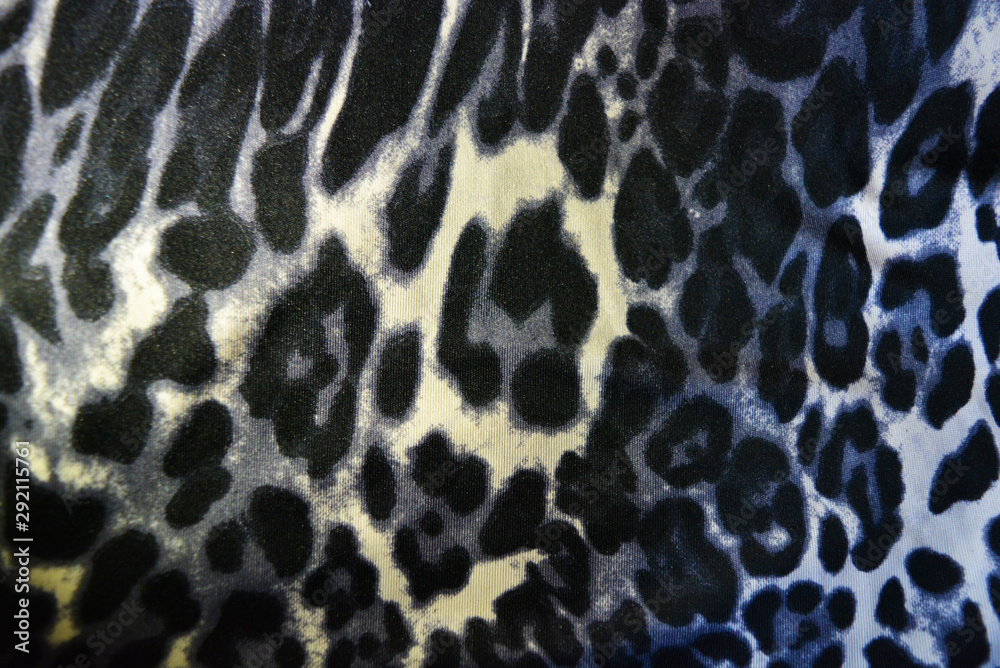 Beautiful animal print with spots, leopard pattern and animal skin, white-brown with gray spots. Beautiful animal print with spots, leopard pattern and animal skin, white-brown with gray spots.