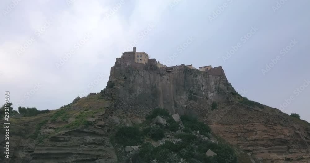 Aerial view of the Fort of San Giorgio, a 16th century castle located on a hill near the port of the Island of Capraia, Tuscan Archipelago, Italy. Aerial view of the Fort of San Giorgio, a 16th century castle located on a hill near the port of the Island of Capraia, Tuscan Archipelago, Italy.