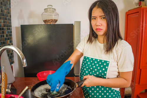 Fotografie domestic chores lifestyle portrait of young tired and stressed Asian Korean woma