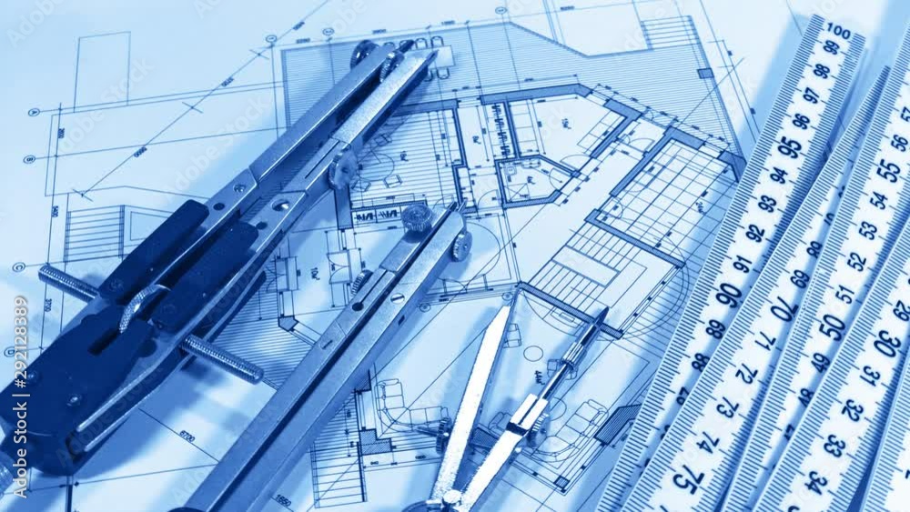 Blueprints: architectural drawings, yardstick - folding ruler & samples of modern interior decoration materials - decorative plastics smoothly rotate on the surface of the architectural plan Blueprints: architectural drawings, yardstick - folding ruler & samples of modern interior decoration materials - decorative plastics smoothly rotate on the surface of the architectural plan
