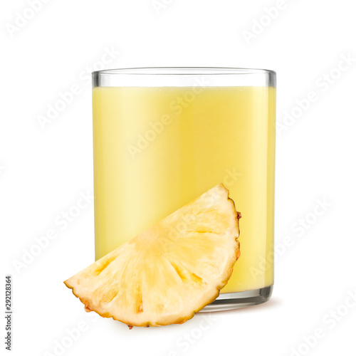 Glass of pineapple juice and slices of pineapple on white background