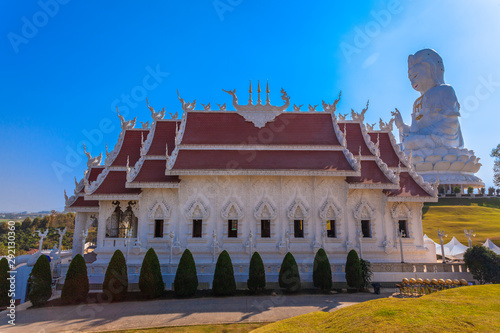 beautiful white church infront of the biggest Guan Yin statue in Chinese temple wat Hyua Pla Kang at Chiang Rai north of Thailand.. photo