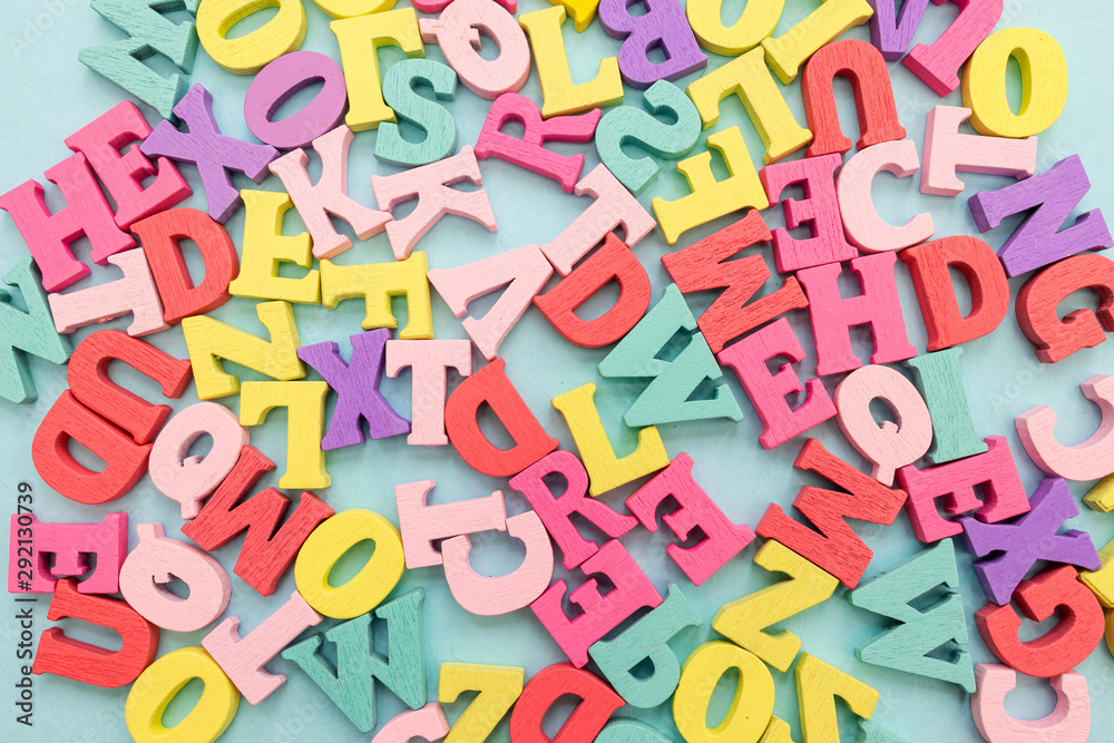 Alphabet wooden letters abstract on color background Alphabet wooden letters abstract on color background