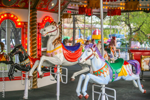 Merry-go-round with horses. Carousel with horses. Amusement Park in the city © shubas