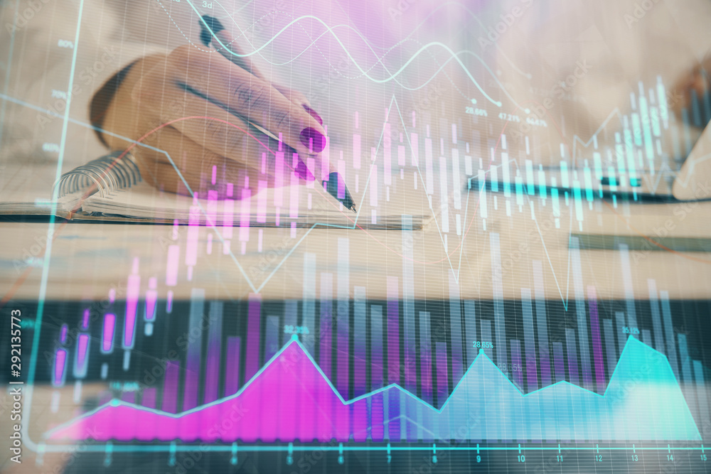 Double exposure of woman's hands making notes with forex graph hologram. Concept technical analysis. Double exposure of woman's hands making notes with forex graph hologram. Concept technical analysis.