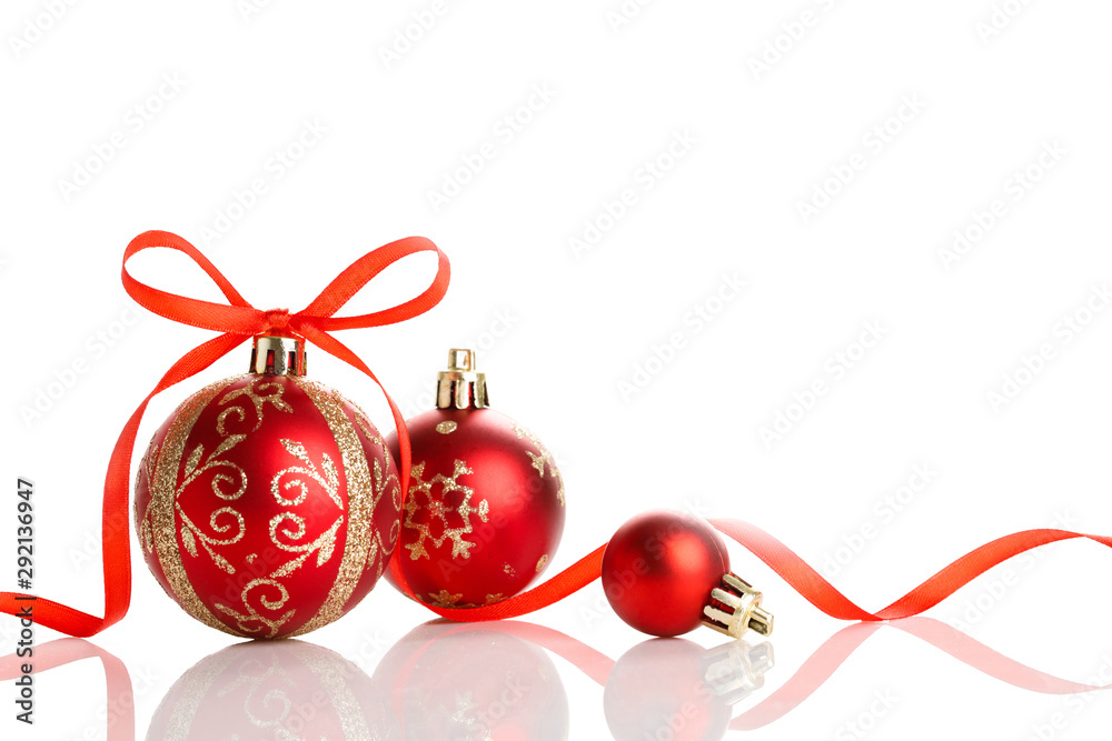 Red christmas ball with ribbon bow on white background. - obrazy, fototapety, plakaty 